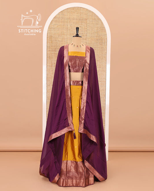 Mustard-wine taffeta half-saree, zari buttas with contrast traditional zari bordered skirt, a matching blouse, and contrast zari border dhavani with belt