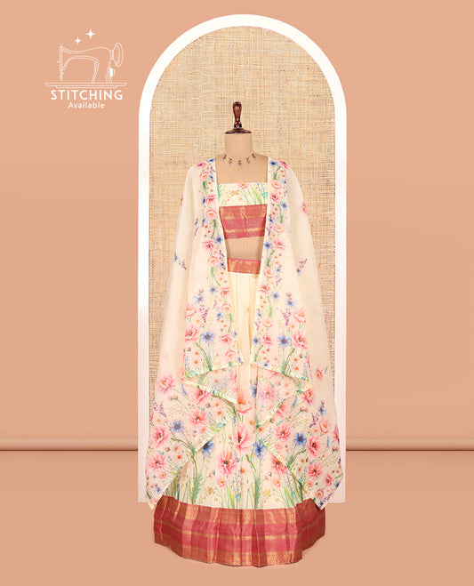 Cream-Rani Pink Semi-Silk Half-Saree Features Floral-Printed Skirt, a Contrast Traditional Border, a Matching Blouse, a Floral Dhavani