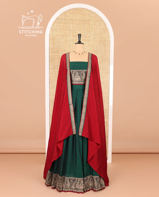 Green half-saree, plain with contrast human dancing motifs woven bordered skirt, matching blouse , and a contrast thin bordered dhavani