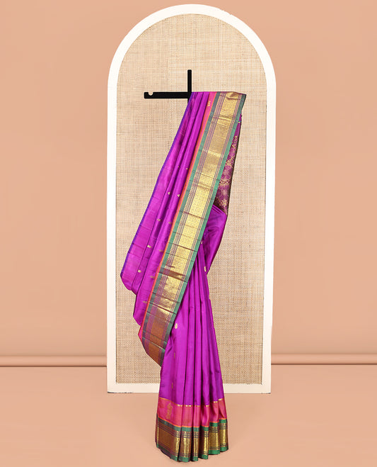 Pink Kanchipuram Silk Saree, Decorated with Zari Buttas, Complemented by a Contrast Zari One-Sided Border of Panner Sombu, Banaras, Muthu, and Jaal Designs, Zari Design Pallu, and No Blouse
