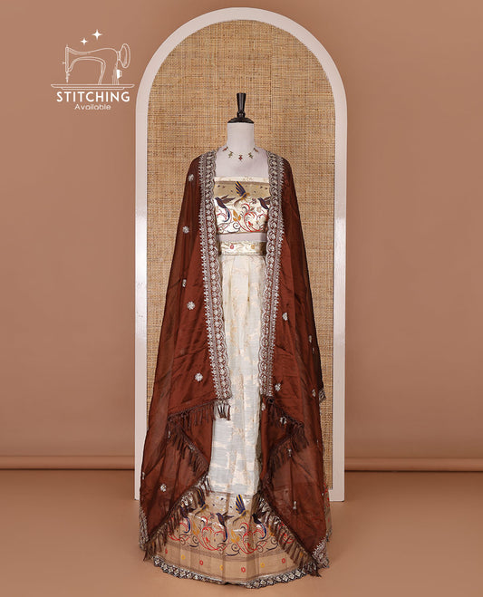 Cream banaras halfsaree, jaal jacquard skirt, contrast wine paithani border, matching blouse, and Syska georgette embroidered dhavani