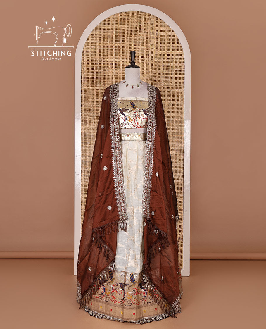 Cream banaras halfsaree, jaal jacquard skirt, contrast wine paithani border, matching blouse, and Syska georgette embroidered dhavani