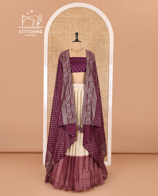 Cream-wine Vichitra half-saree, plain and contrast bordered skirt, contrast leaf buttas blouse, dhavani of buttas and floral creeper designs