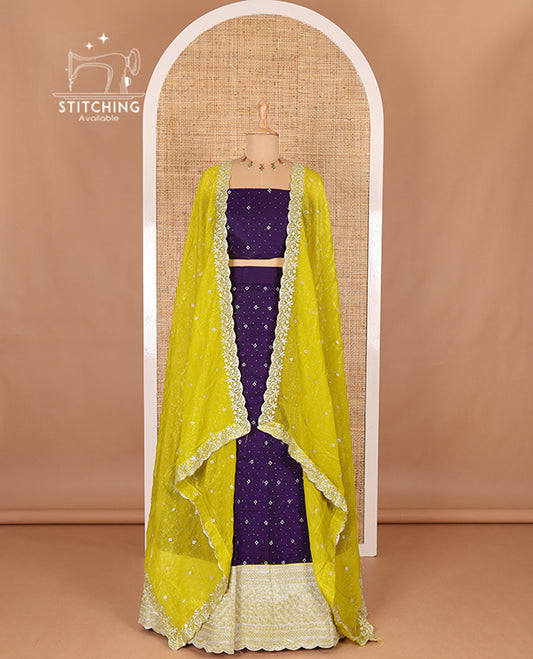 Violet half-saree, floral motifs embroidered semi raw silk top, matching embroidered blouse, and contrast scallop embroidered georgette dhavani