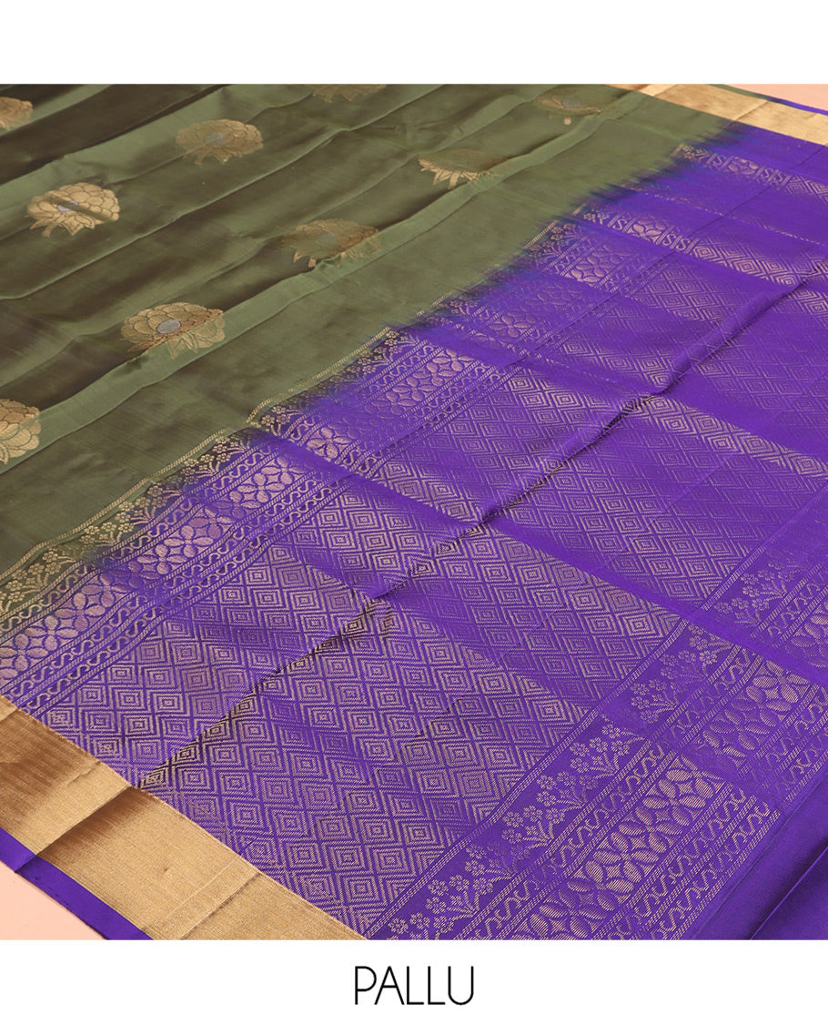 Green Mayuri Lite Silk Mix Saree, Gleamed Up with Zari Buttas, a Zari Border, Contrast Geometric Patterned Pallu, and a Contrast Blouse