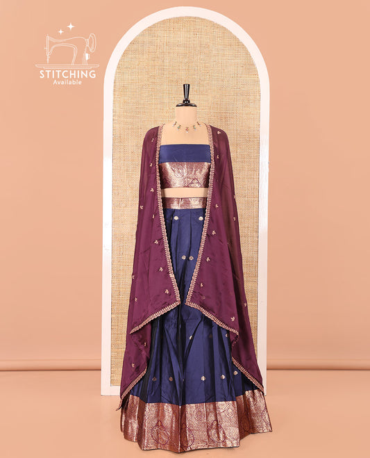 Blue and Purple Semi-Banarasi Half-Saree, Elevated with Zari Buttas on Its Skirt, Complemented by a Contrast Intricately Zari-Designed Border, Paired with a Matching Blouse, and a Contrast Satin Georgette Embroidered Scallop Dhavani