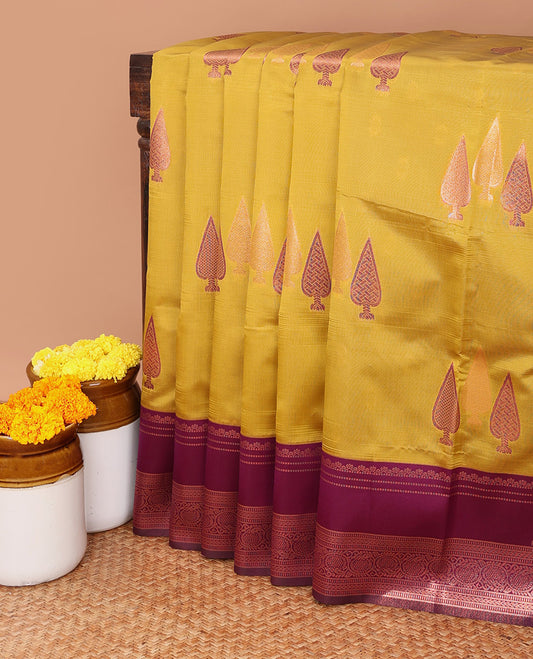 Mustard copper zari butta litchi soft silk saree with contrast double pad border & zari butta blouse