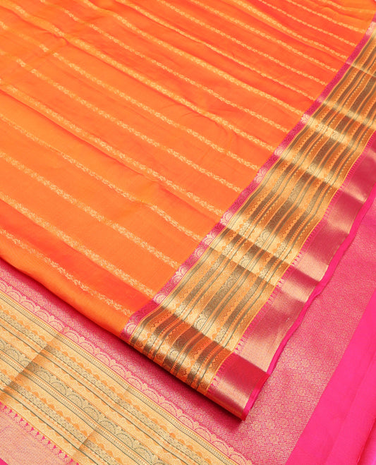 Orange Vasundhara Lite Silk Mix Saree, Accentuated With Zari Stripes On Its Body, Complemented by Contrast Meenakari-style Zari Woven Border, Grand Jaal Pallu and Paired with a Contrast Blouse