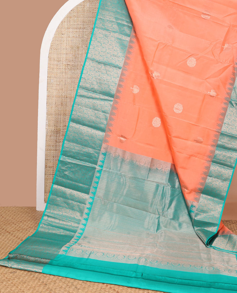 Peach buttas silk saree with contrast border of temple, floral design & floral jaal pallu