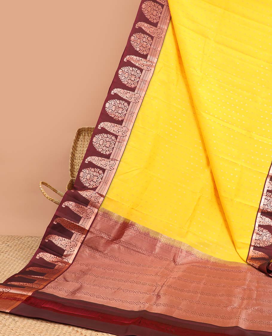 Yellow vasundhara silk mix saree with contrast zari design border & traditional zari design pallu