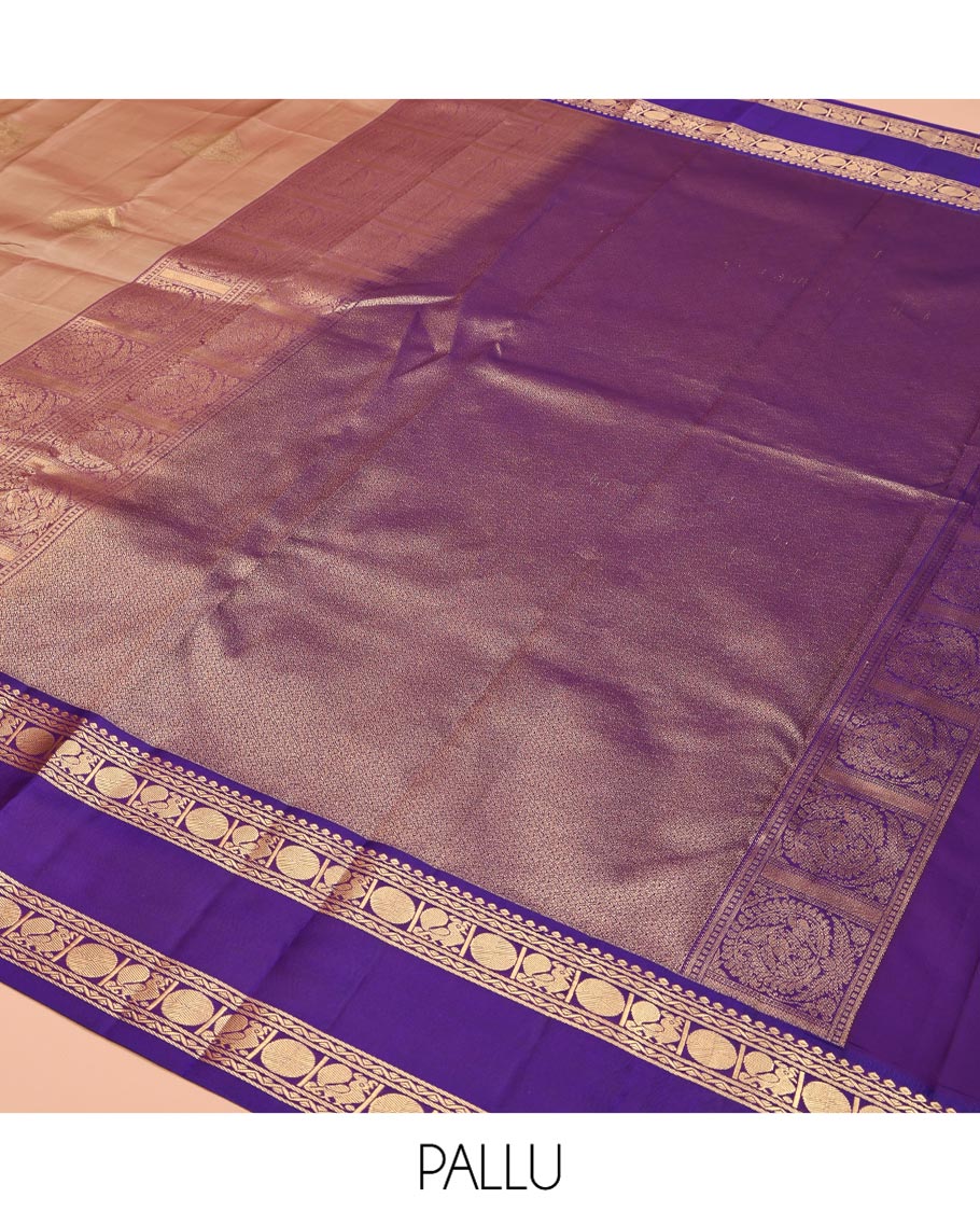 Beige Vasundhara Lite Silk Mix Saree, Accentuated With Zari Buttas All Over Its Body, Complemented by Contrast Rettai Pettu Border of Salngai, Neli, Poun and Mayil Designs, Gleaming Zari Pallu, and Paired with a Contrast Blouse