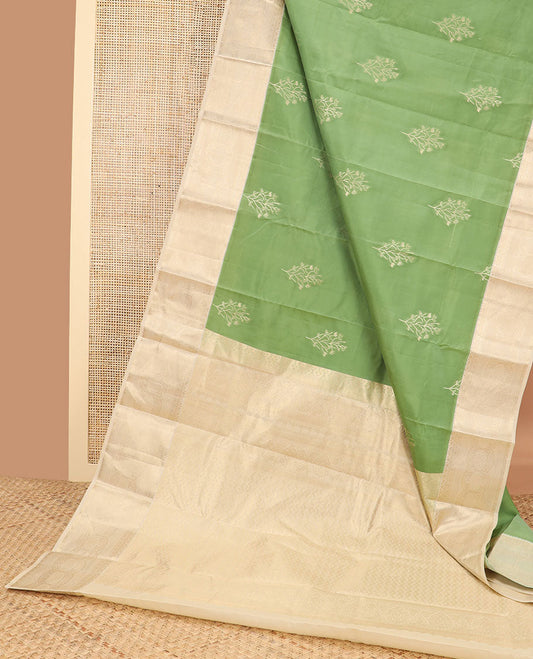 Green buttas vasundhara elite silk saree with contrast floral design border & intricate zari design pallu