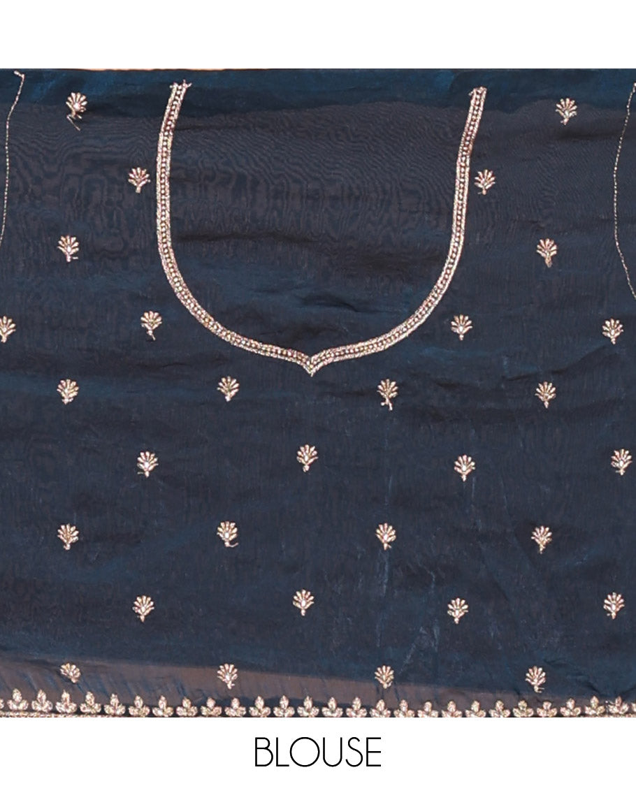 Peacock blue half-saree, buttas and flora-fauna embroidered bordered velvet organza skirt, a matching velvet organza blouse, and a contrast embroidered scallop syska georgette dhavanif