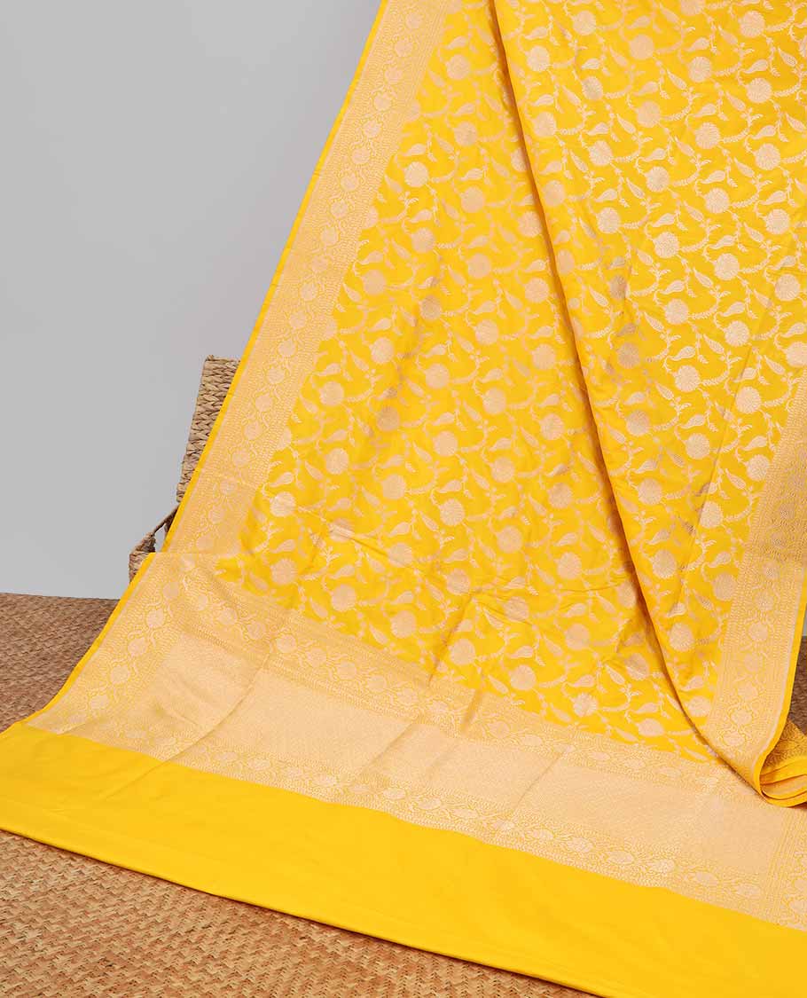 Yellow floral jacquard banaras silk saree with self intricate zari border & floral zari design pallu