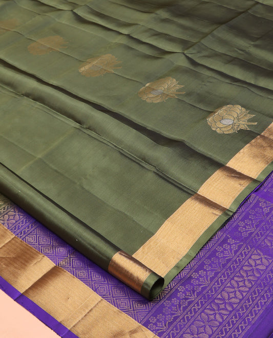 Green Mayuri Lite Silk Mix Saree, Gleamed Up with Zari Buttas, a Zari Border, Contrast Geometric Patterned Pallu, and a Contrast Blouse
