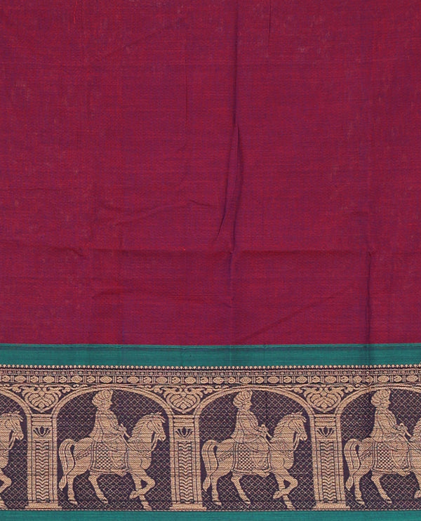 Magenta with green mercedised cotton half-saree, contrast elephant zari border skirt, matching blouse & one side border georgette dhavani