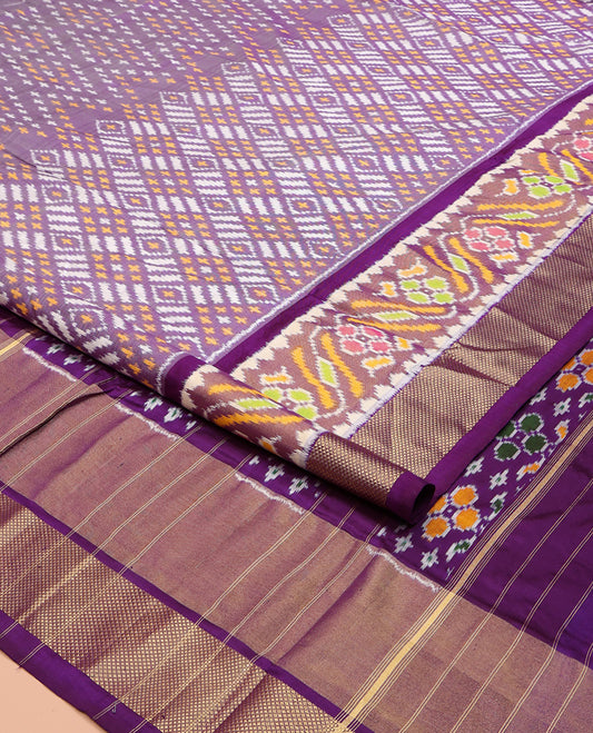 Lavender Ikkat Silk Saree, Embellished with Ikkat Buttas All Over Its Body, Highlighted by a Self-Border of Ikkat and Zari Designs, Pallu of Floral Meena Designs, and Paired with a Matching Blouse