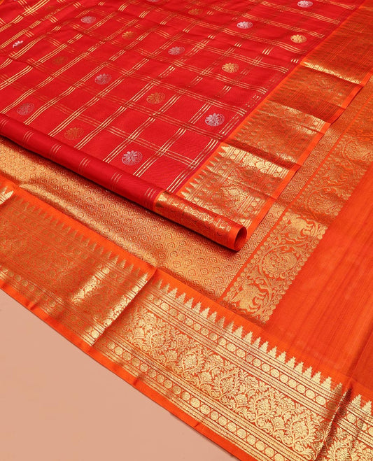 Red Venkatagiri Silk Saree, Enriched with Zari Butta Enclosed Checks All Over Its Body, Complemented by a Contrast Temple Border of Traditional Designs, Grand Pallu of Jaal Designs, and Paired with a Contrast Blouse