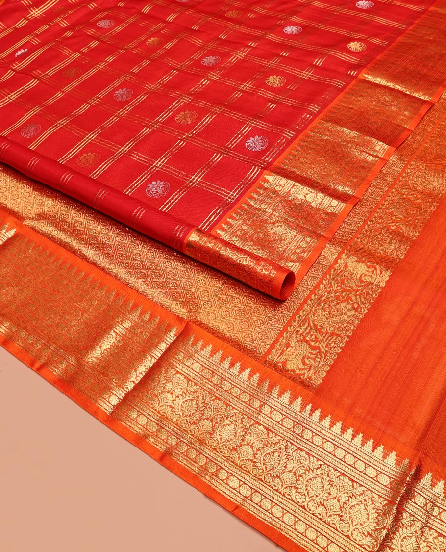 Red Venkatagiri Silk Saree, Enriched with Zari Butta Enclosed Checks All Over Its Body, Complemented by a Contrast Temple Border of Traditional Designs, Grand Pallu of Jaal Designs, and Paired with a Contrast Blouse