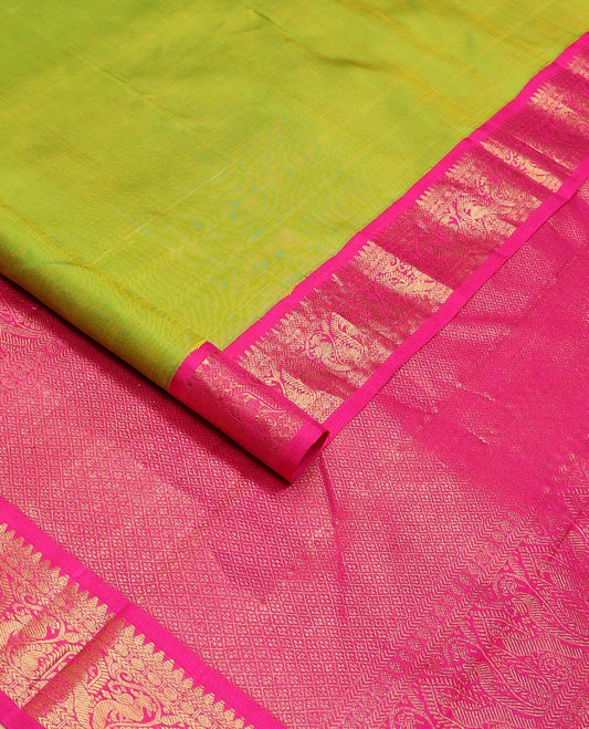 Green plain Kanchipuram korvai silk saree, contrast neer korvai border of thilakam mokku, kathir, poun, and mayil kann designs, and jaal pallu