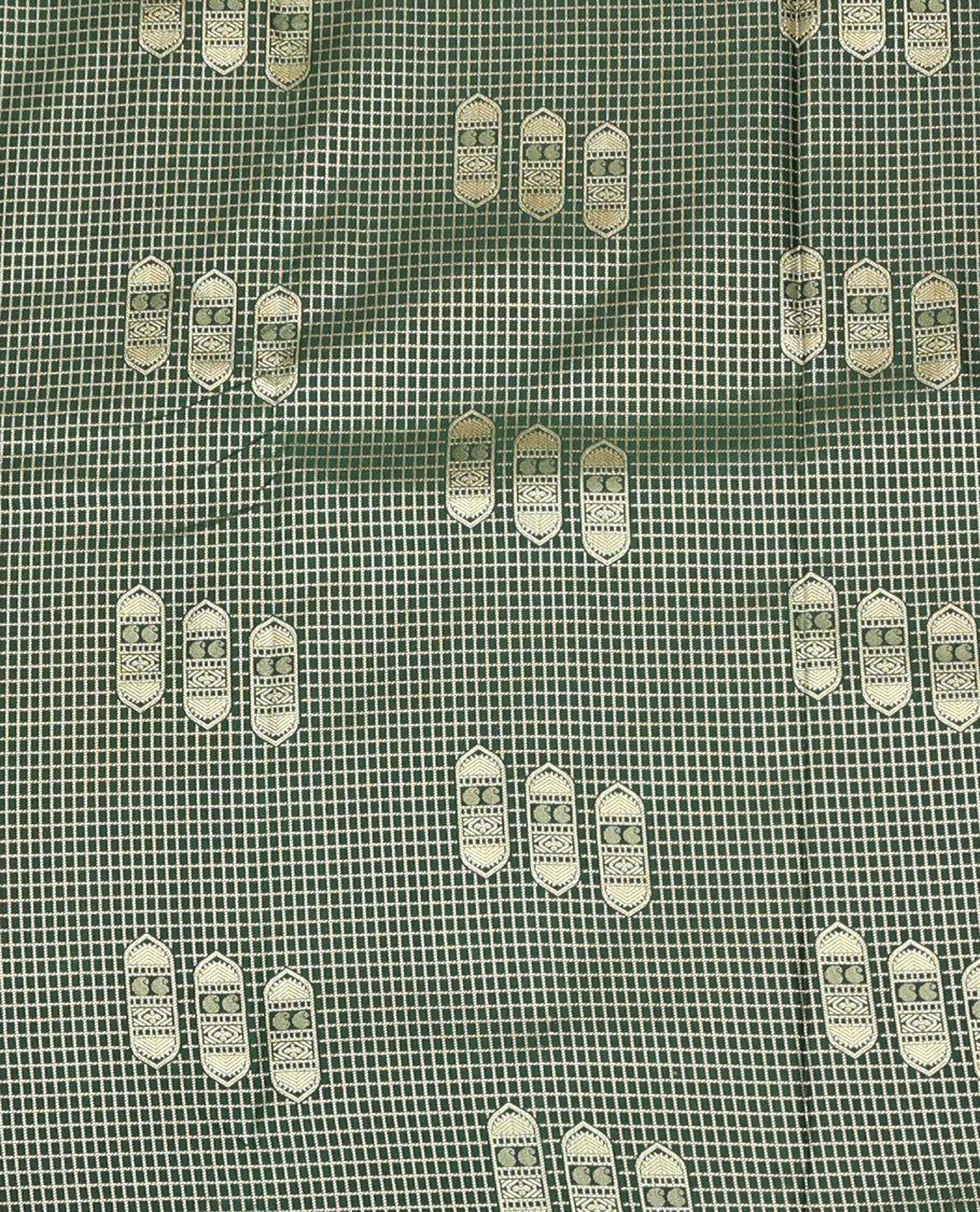 Green Art Silk Material Half Saree Set Featuring a Zari Buttas and Checked Skirt, a Contrast Traditional Zari Design Border, Contrast Blouse, and Zari Designs Dhavani