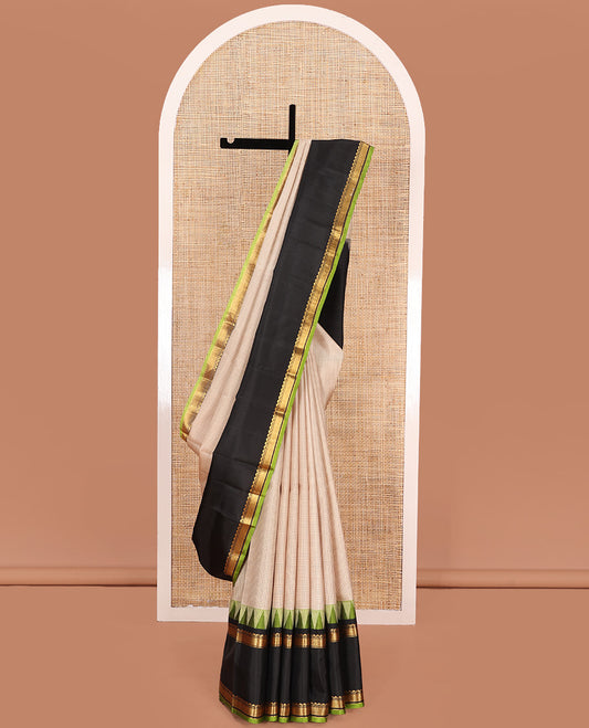 Sandal checked Kanchipuram silk saree, contrast thazampoo rekku rettai pettu border of salngai, banaras, and mayil kann, and zari striped pallu