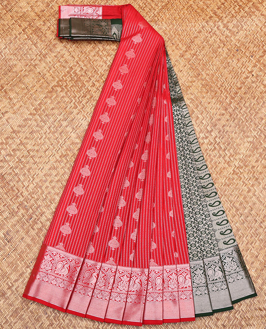 Red Budget Silk Saree, Impeccably Styled with Zari Buttas All Over Its Body, Highlighted by Traditional Zari Design Border, Complemented by Contrast Intricately Designed Pallu, and Paired with a Contrast Blouse