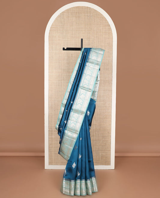 Blue floral motifs raw mango silk saree with contrast zari design border & floral design pallu