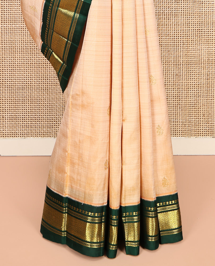 Sandal Kanchipuram Silk Saree, Sparsely Sparkled with Zari Buttas, Contrast One-Sided Korvai Border of Panner Sombu, Banaras, Muthu, and Mayil Kann Designs, Zari Design Pallu, and No Blouse