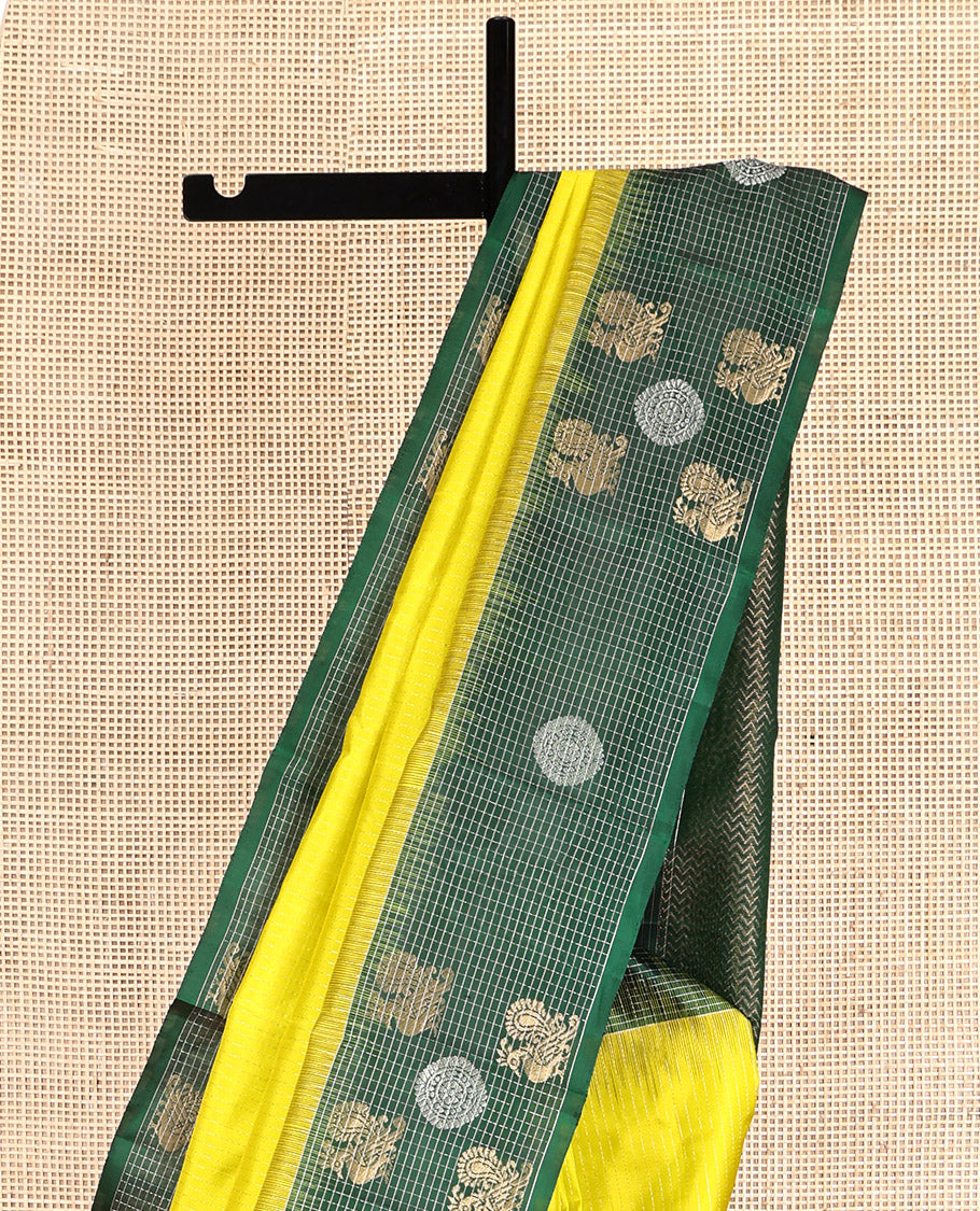 Yellow Kanchipuram Silk Saree, Sparsely Woven with Vaira Oosi Stripes, Complemented by a Contrast Checked Mayil-Chakram Border, Vanki Pallu, and a Contrast Blouse