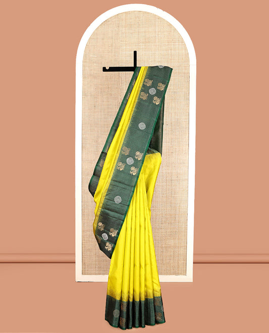 Yellow Kanchipuram Silk Saree, Sparsely Woven with Vaira Oosi Stripes, Complemented by a Contrast Checked Mayil-Chakram Border, Vanki Pallu, and a Contrast Blouse