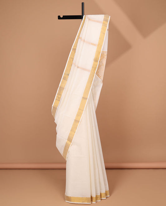 Cream kerala saree with zari stripes, zari border & pallu of intricate designs in zari
