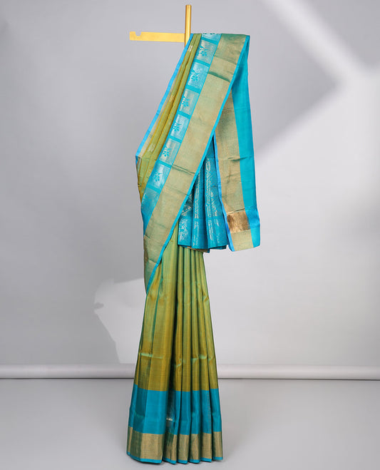 Green floral design uppada silk saree with contrast zari border & floral enclosed with checked design pallu