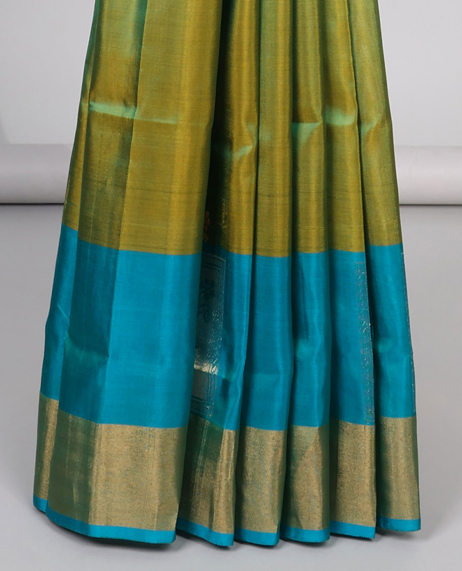 Green floral design uppada silk saree with contrast zari border & floral enclosed with checked design pallu
