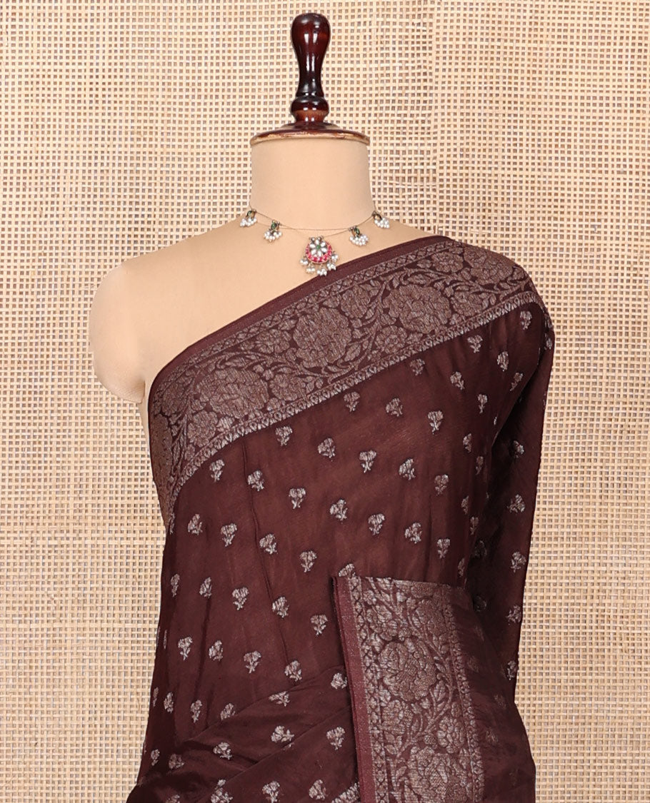 Brown Fancy Crepe Saree, Subtly Sparkled with Buttas, Highlighted by a Floral Creeper Border, Intricate Pallu, and a Matching Blouse