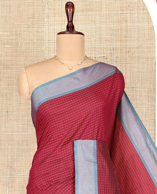Red Aarani Gift Saree, Steeped with Buttas on Its Body, Complemented by a Contrast Border, a Self-Pallu of Stripes, and Paired with a Matching Blouse