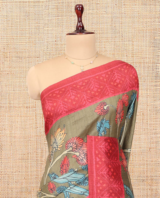 Grey Fancy Tussar Saree Features Kalamkari Floral Vine and Bird Print, Contrast Patola Border, Patola Pallu, and a Contrast Blouse
