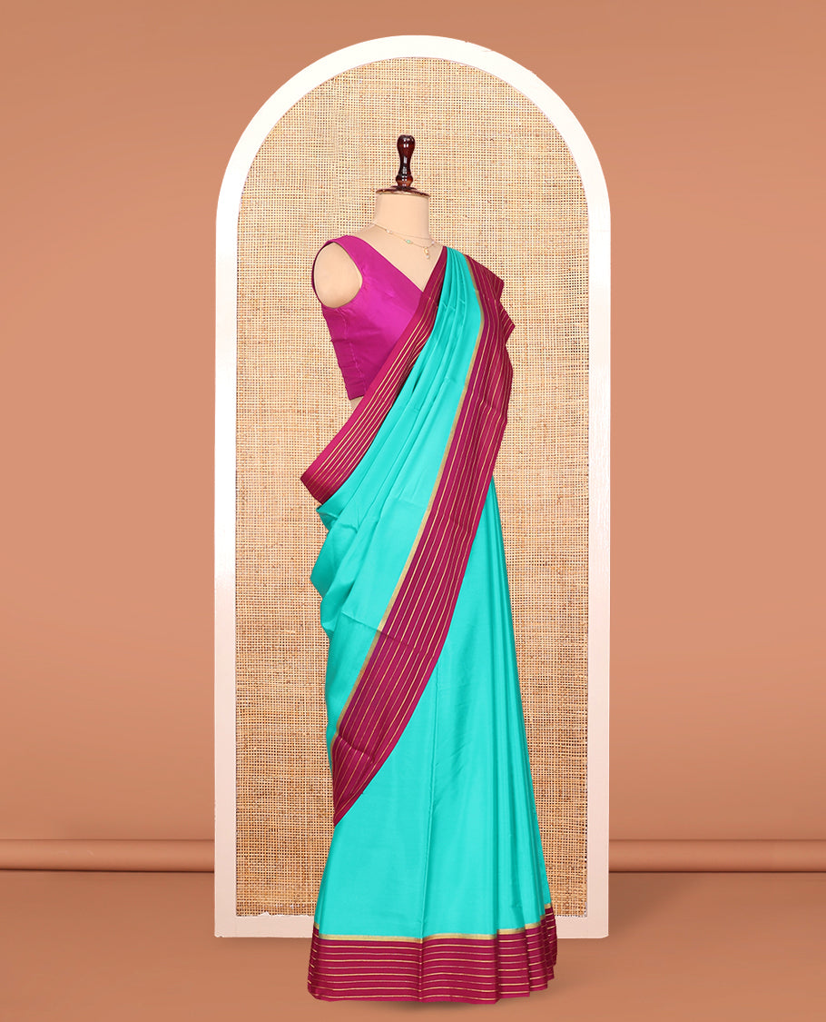 Green Plain Mysore Silk Saree, Complemented by Captivating Contrast Zari Striped Border, Pallu of Vibrant Zari Stripes and Paired with a Contrast Blouse