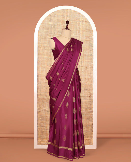 Magenta Mysore Silk Saree Features Paisley Butta, Complemented by Double-pet Zari Border, an Intricate Floral Pallu, and a Matching Blouse