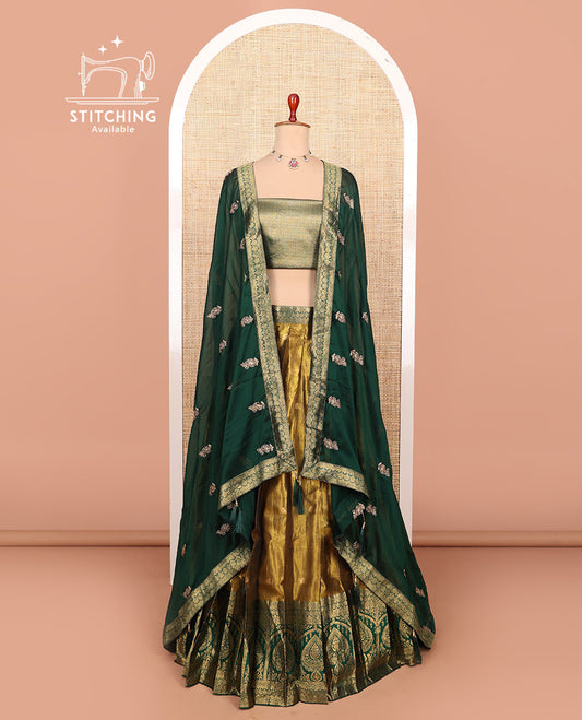 Gold-dark green zari buttas half-saree with contrast Mughal-style unique motifs woven bordered skirt, brocade blouse, and a zari design dhavani