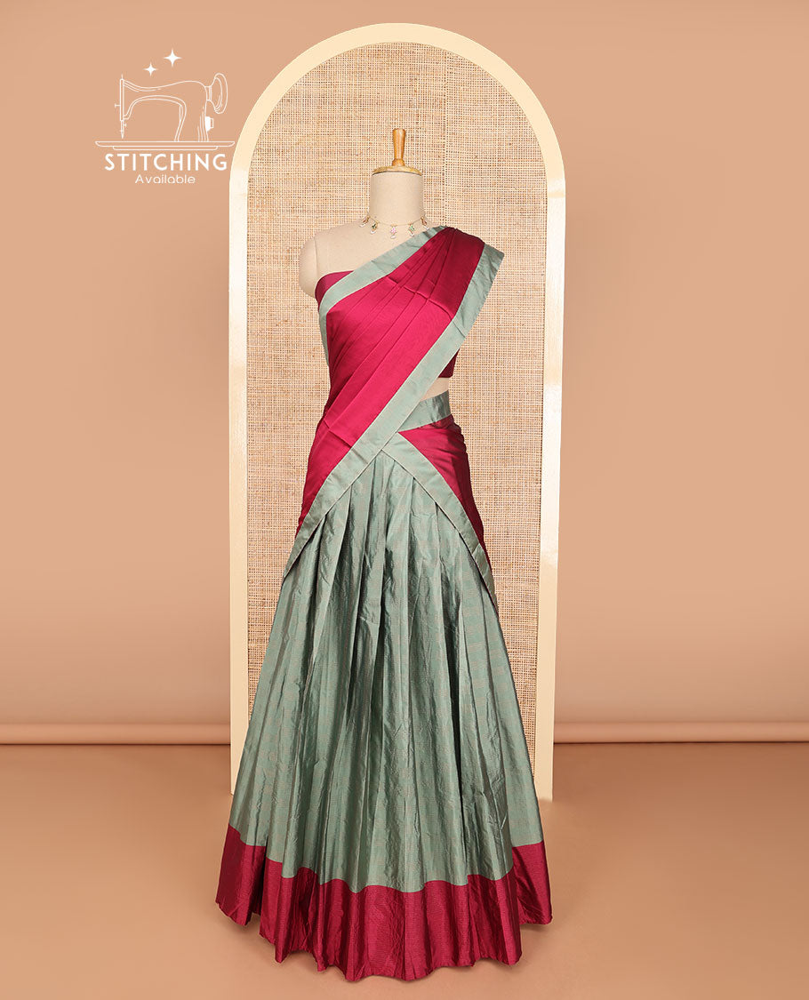 Grey checked half saree with contrast border, plain blouse & plain dhavani