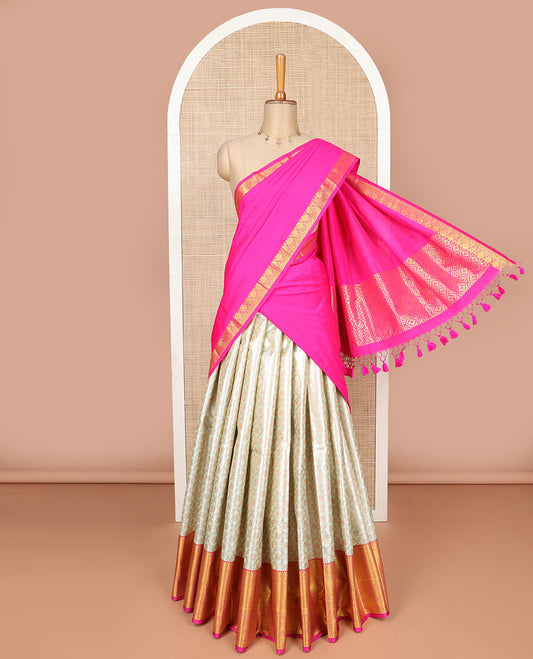 Cream floral jaal design art silk half saree with intricate zari design border, zari design blouse & plain, floral design dhavani