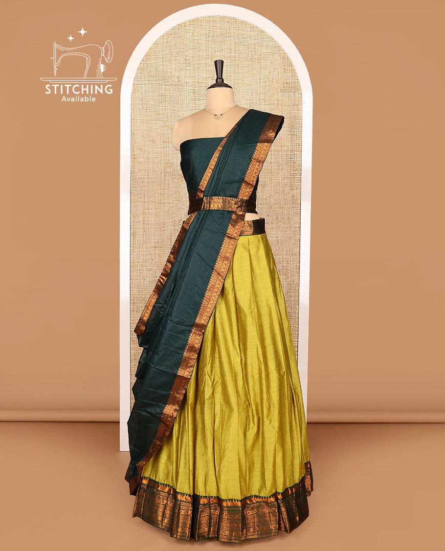Light Green Art Silk Half-Saree Featuring Plain Skirt, Complemented by Contrast Traditional Zari Design Border, Paired with a Contrast Blouse, Contrast Zari-Bordered Dhavani, and Brocade Belt