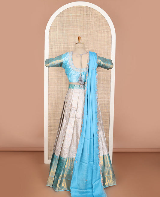 Beige geometric design art silk half saree with contrast zari design border, embroidered blouse & floral embroidery dhavani