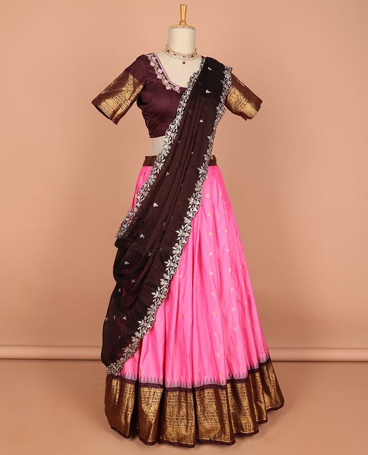 Pink floral buttas semi-stitched half saree with contrast zari border,  embroidered blouse & scallop border dhavani