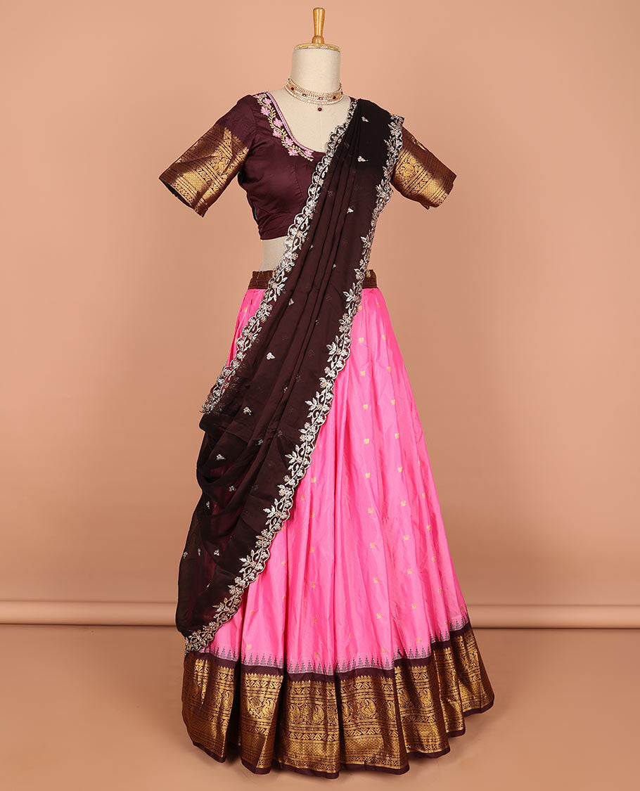 Pink floral buttas semi-stitched half saree with contrast zari border,  embroidered blouse & scallop border dhavani
