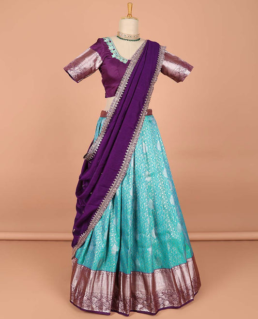 Blue floral jacquard semi-stitched half saree with contrast zari border,  embroidered blouse & scallop border dhavani