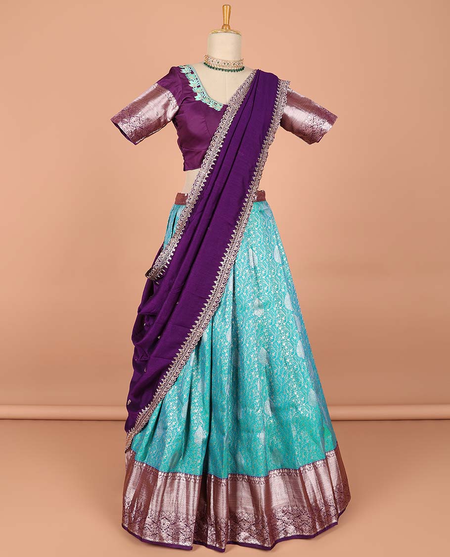 Blue floral jacquard semi-stitched half saree with contrast zari border,  embroidered blouse & scallop border dhavani