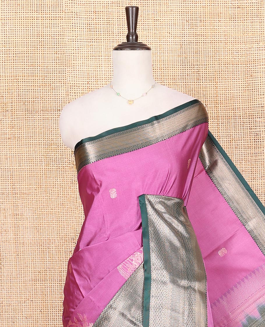 Pink Budget Silk Saree, Graced with Zari Buttas on Its Body, Complemented by a Contrast Traditional Zari Design Border, Pallu of Traditional Designs in Zari, and Paired with a Contrast Blouse