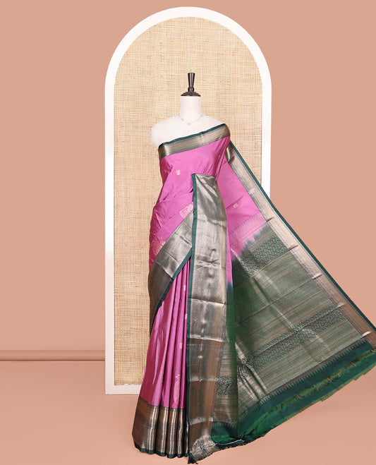 Pink Budget Silk Saree, Graced with Zari Buttas on Its Body, Complemented by a Contrast Traditional Zari Design Border, Pallu of Traditional Designs in Zari, and Paired with a Contrast Blouse